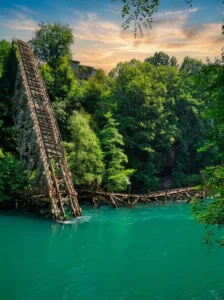 Remains of the destroyed railway bridge on the Neretva River, a symbol of the Battle for the Wounded