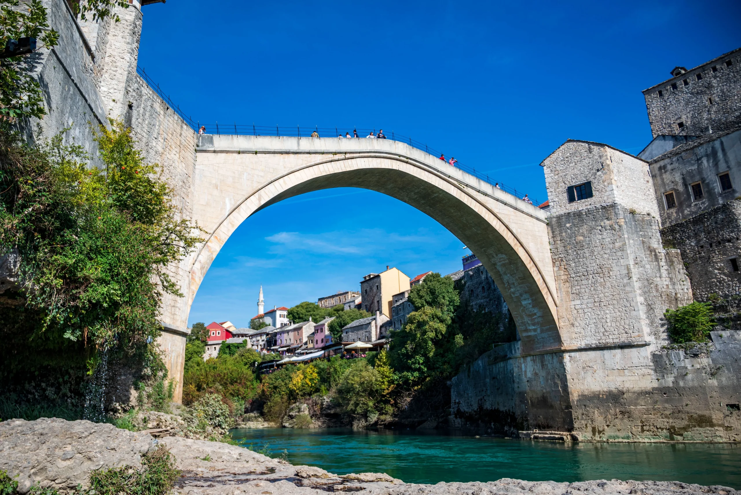 A view of Stari most in Mostar and the Neretva River from below
