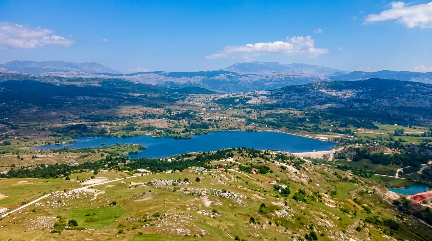 Aerial view of Tribistovo Lake and the surrounding mountain landscape