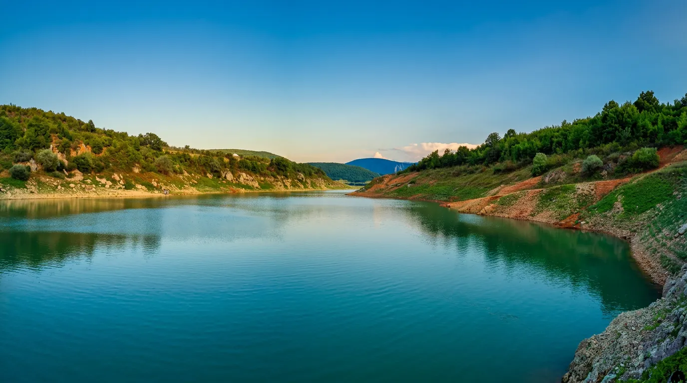 Panoramic view of the calm Župica Lake on a sunny day
