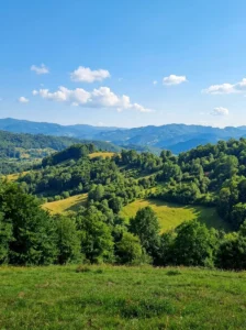 Green slopes and the landscape of Majevica mountain during a sunny day