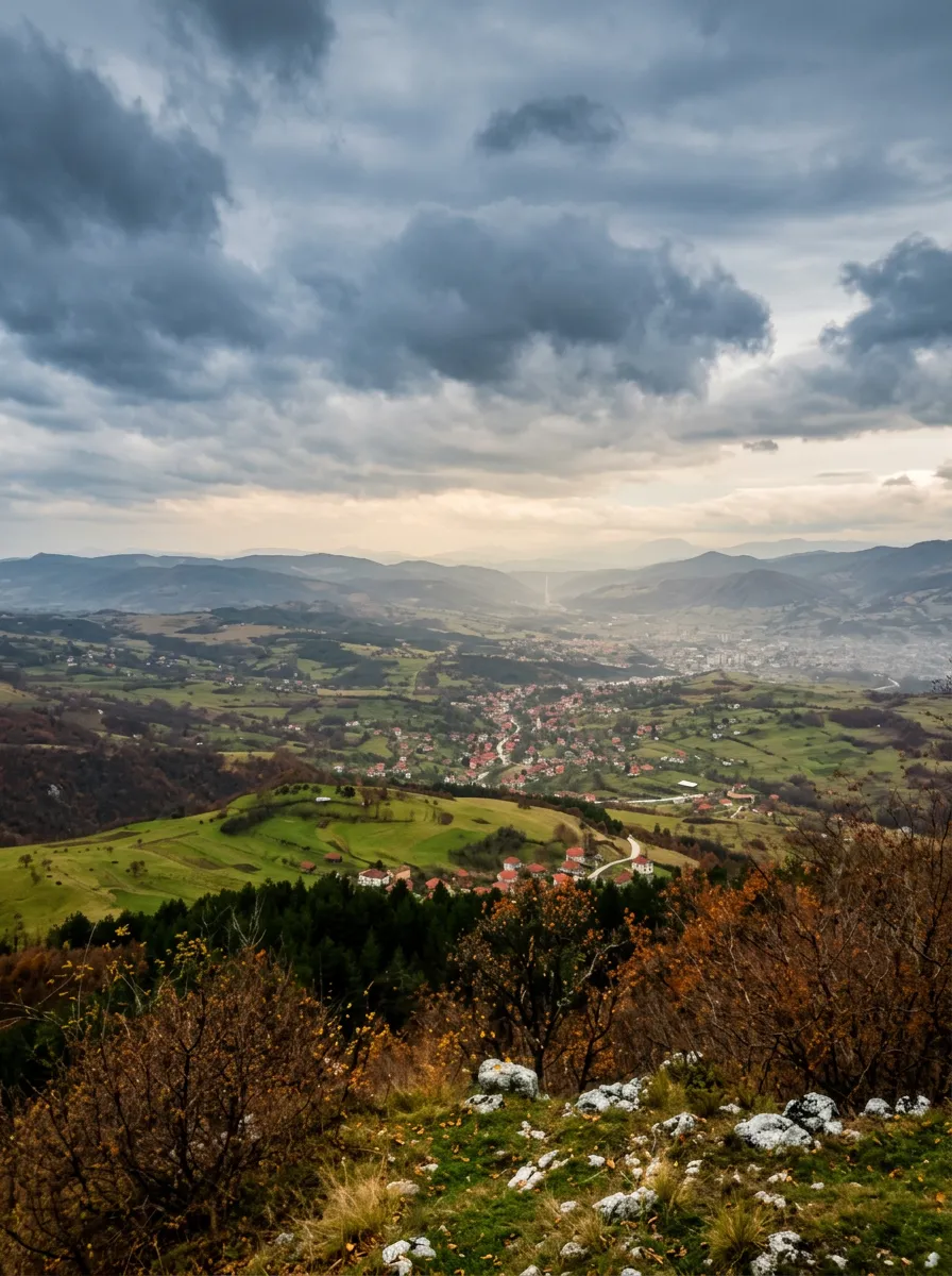Dramatic view of the town of Kakanj and the surrounding area from Gradina viewpoint under cloudy skies